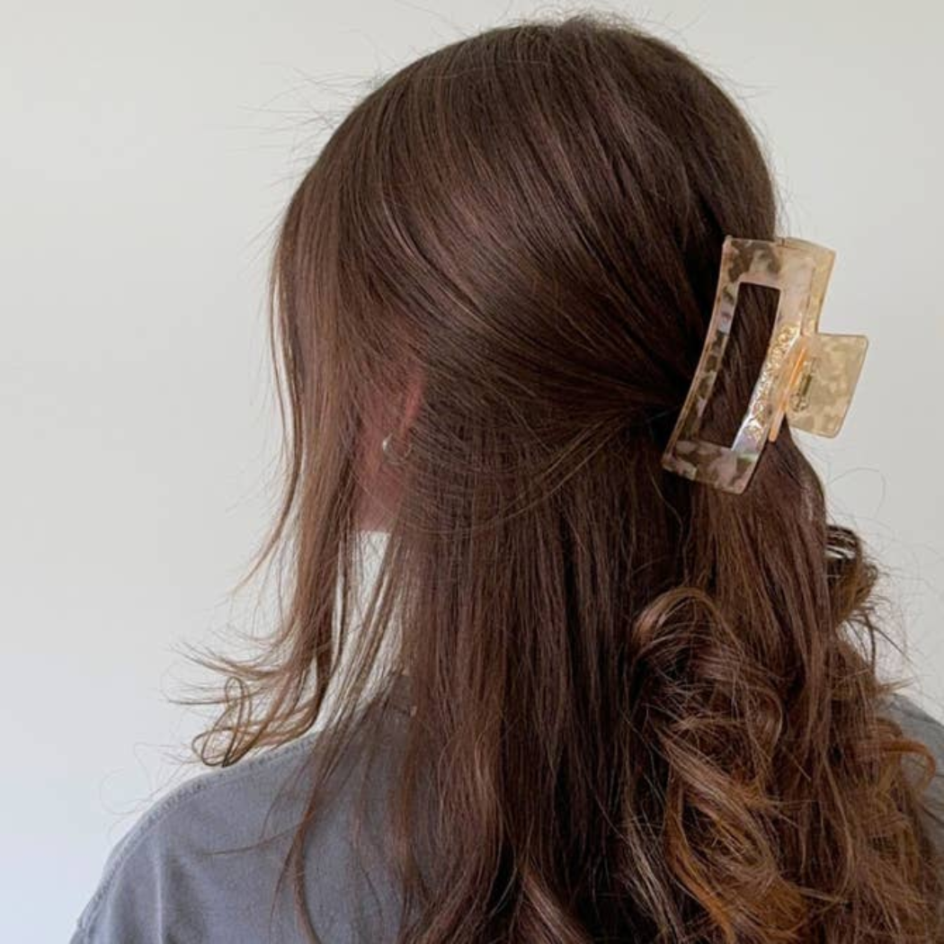 Aven Shimmer Cellulose Acetate Hair Claw Clip in gold-flecked design – eco-friendly, durable, and stylish hair accessory for medium to long hair.