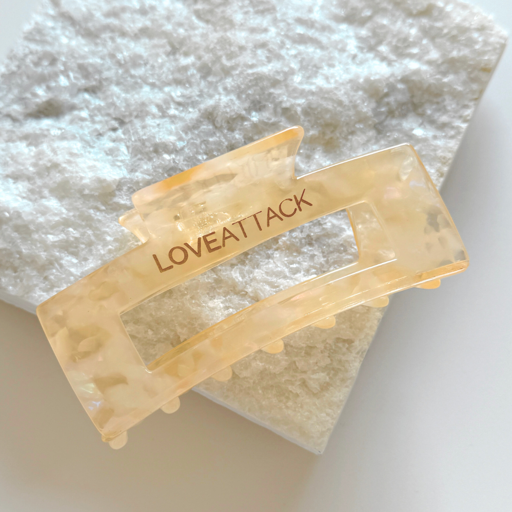 Aven Shimmer Cellulose Acetate Hair Claw Clip in gold-flecked design – eco-friendly, durable, and stylish hair accessory for medium to long hair.