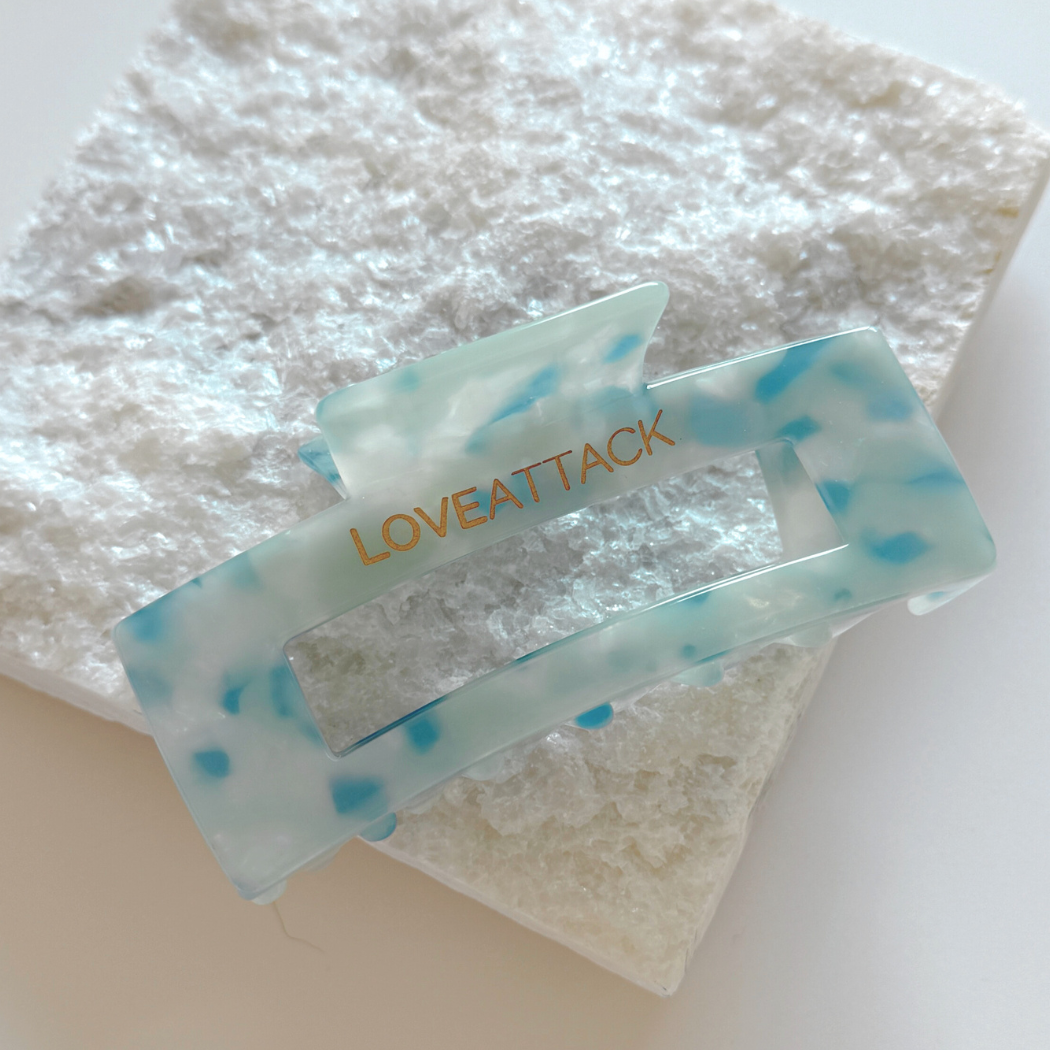 Aven Shimmer Cellulose Acetate Hair Claw Clip in gold-flecked design – eco-friendly, durable, and stylish hair accessory for medium to long hair.