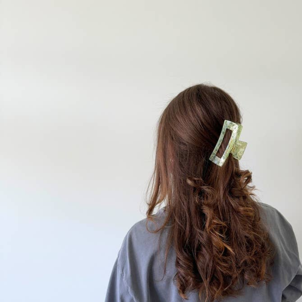 Aven Shimmer Cellulose Acetate Hair Claw Clip in gold-flecked design – eco-friendly, durable, and stylish hair accessory for medium to long hair.