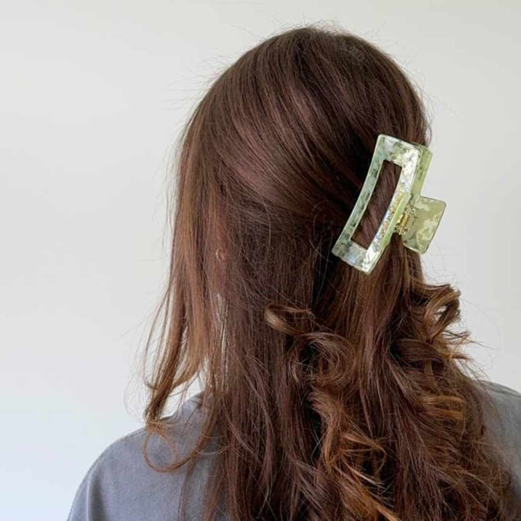 Aven Shimmer Cellulose Acetate Hair Claw Clip in gold-flecked design – eco-friendly, durable, and stylish hair accessory for medium to long hair.