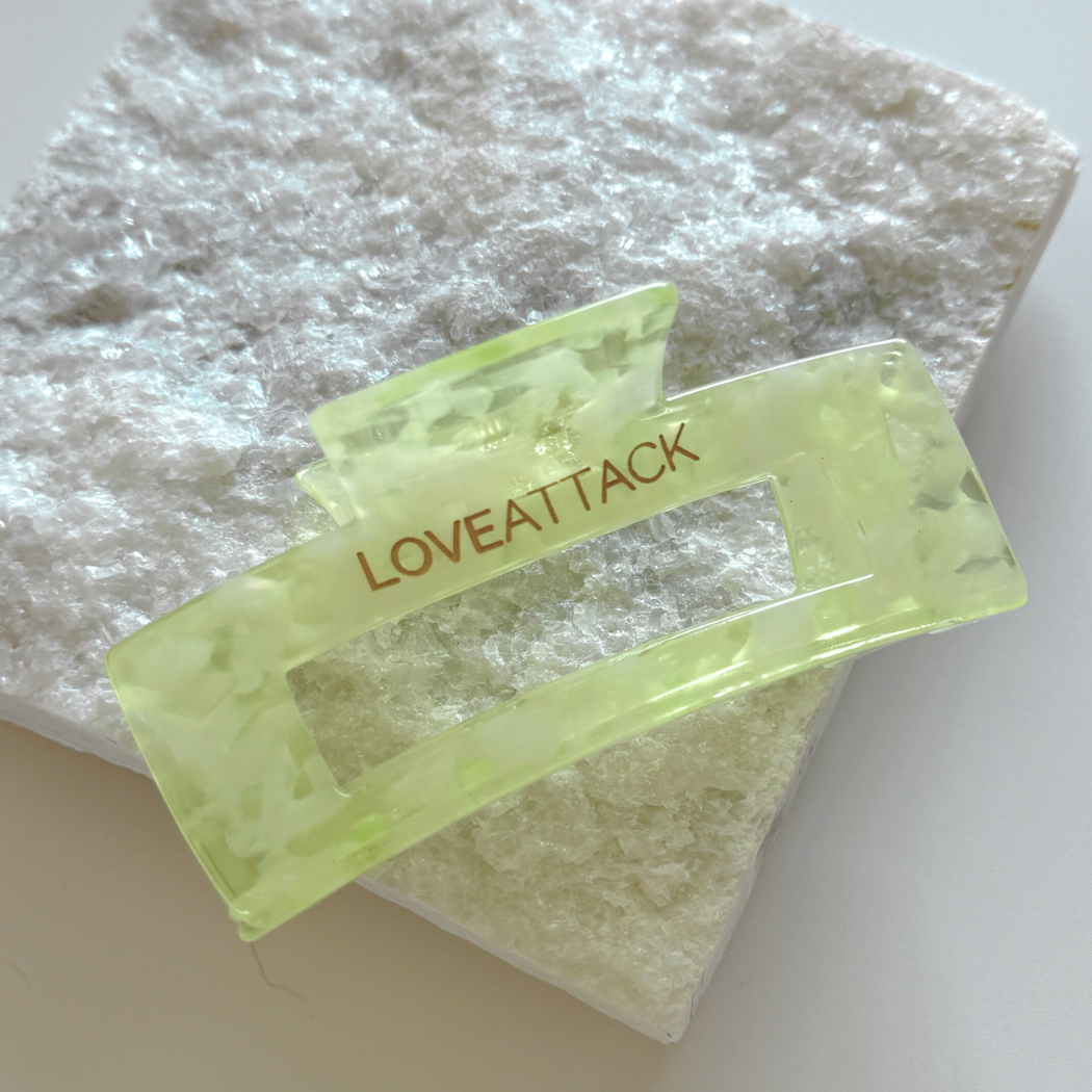 Aven Shimmer Cellulose Acetate Hair Claw Clip in gold-flecked design – eco-friendly, durable, and stylish hair accessory for medium to long hair.